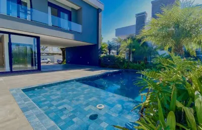 Casa em condomínio fechado com 7 quartos à venda na lagomar, 100, velas da marina, capão da canoa, 570 m2 por r$ 12.800.000