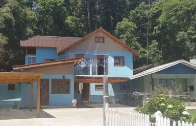 Casa em condomínio fechado com 3 quartos à venda na rua parobé linha nova, 593, avenida central, gramado, 180 m2 por r$ 2.000.000