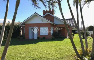 Casa em condomínio fechado com 4 quartos à venda na rua miraguaia, 159, centro, xangri-lá, 284 m2 por r$ 980.000