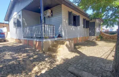 Casa com 4 quartos à venda na jose valdir garcia, 34, columbia city, guaíba, 130 m2 por r$ 400.000