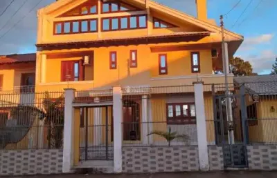 Casa com 4 quartos à venda na avenida vasco alves pereira, 6, morada da colina, guaíba, 106 m2 por r$ 980.000