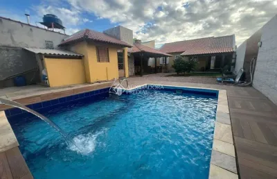 Casa com 2 quartos à venda na rua dezessete de dezembro, 30, jardim dos lagos, guaíba, 113 m2 por r$ 530.000