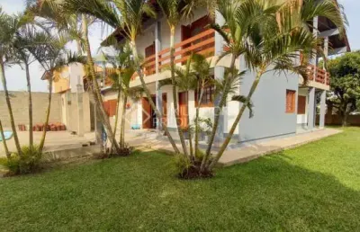 Casa em condomínio fechado com 4 quartos à venda na avenida maurício lessa, 535, flórida, guaíba, 306 m2 por r$ 840.000