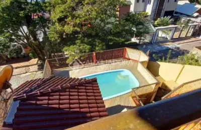Casa em condomínio fechado com 3 quartos à venda na rua aladim de araújo pinto, 353, centro, guaíba, 308 m2 por r$ 1.590.000