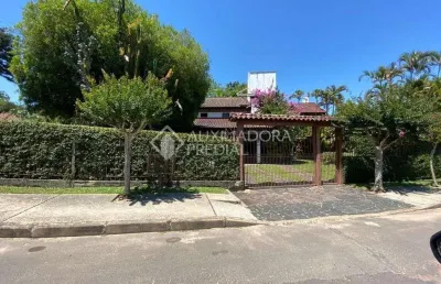 Casa em condomínio fechado com 4 quartos à venda na avenida florida, 290, flórida, guaíba, 500 m2 por r$ 1.500.000