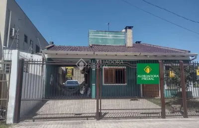 Casa com 3 quartos à venda na rua tocantins, 181, parque 35, guaíba, 122 m2 por r$ 550.000