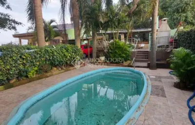 Casa com 2 quartos à venda na travessa jorge elejalde, 823, ermo, guaíba, 68 m2 por r$ 350.000