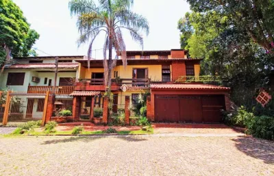 Casa com 6 quartos à venda na rua azevedo sodré, 514, passo da areia, porto alegre, 390 m2 por r$ 1.499.900