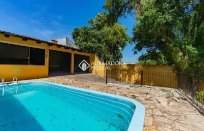 Casa com 3 quartos à venda na rua expedicionário, 293, nossa senhora das graças, canoas, 200 m2 por r$ 580.000
