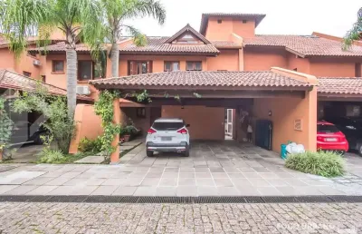 Casa em condomínio fechado com 4 quartos à venda na rua ênio andrade, 320, três figueiras, porto alegre, 520 m2 por r$ 8.999.000