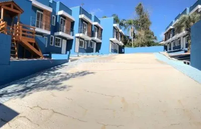 Casa em condomínio fechado com 2 quartos à venda na rua pero vaz de caminha, 170, tarumã, viamão, 52 m2 por r$ 235.100