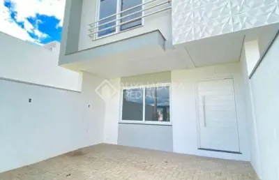 Casa em condomínio fechado com 3 quartos à venda na rua ravena, 70, estância velha, canoas, 125 m2 por r$ 689.990