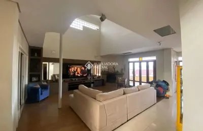 Casa com 3 quartos à venda na rua joaquim cruz, 130, santo antônio, porto alegre, 330 m2 por r$ 1.400.000