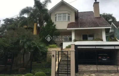 Casa em condomínio fechado com 3 quartos à venda na rua cangerana, 660, são lucas, viamão, 222 m2 por r$ 1.100.000