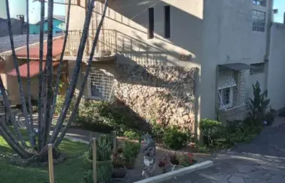 Casa com 4 quartos à venda na avenida joracy camargo, 289, santa tereza, porto alegre, 187 m2 por r$ 1.150.000