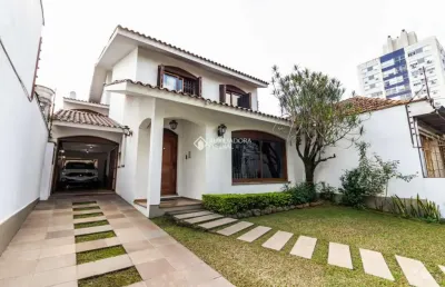 Casa com 6 quartos à venda na rua vicente da fontoura, 1016, rio branco, porto alegre, 315 m2 por r$ 1.500.000
