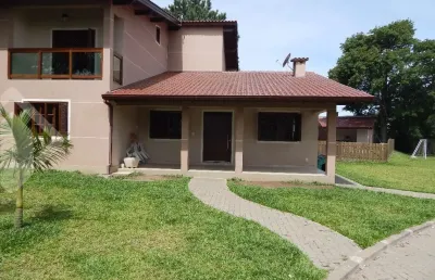 Casa em condomínio fechado com 4 quartos à venda na rua portela, 40, florescente, viamão, 350 m2 por r$ 950.000