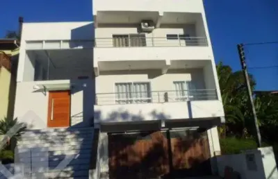 Casa em condomínio fechado com 3 quartos à venda na avenida senador salgado filho, 6614, jardim krahe, viamão, 400 m2 por r$ 950.000