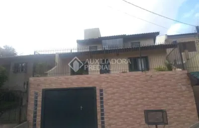 Casa em condomínio fechado com 3 quartos à venda na rua nova araça, 67, vila augusta, viamão, 190 m2 por r$ 500.000