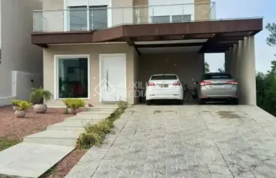 Casa em condomínio fechado com 3 quartos à venda na avenida senador salgado filho, 8500, jardim krahe, viamão, 200 m2 por r$ 1.800.000