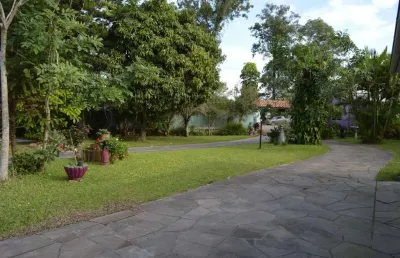 Casa com 3 quartos à venda na avenida do lami, 1580, belém novo, porto alegre, 300 m2 por r$ 980.000