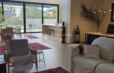 Casa em condomínio fechado com 3 quartos à venda na avenida juca batista, 8000, belém novo, porto alegre, 350 m2 por r$ 3.300.000