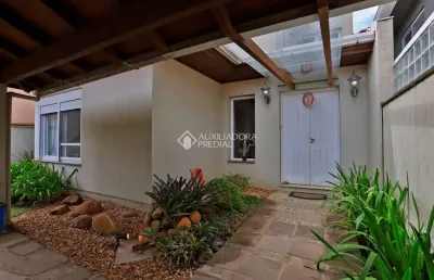 Casa em condomínio fechado com 3 quartos à venda na avenida juca batista, 8000, belém novo, porto alegre, 294 m2 por r$ 1.685.000