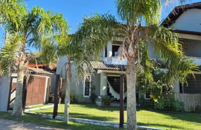 Casa em condomínio fechado com 4 quartos à venda na das camélias, 927, noiva do mar, xangri-lá, 120 m2 por r$ 590.000