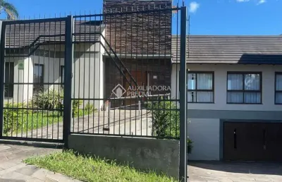 Casa em condomínio fechado com 4 quartos à venda na rua cambará, 824, viamópolis, viamão, 408 m2 por r$ 1.500.000