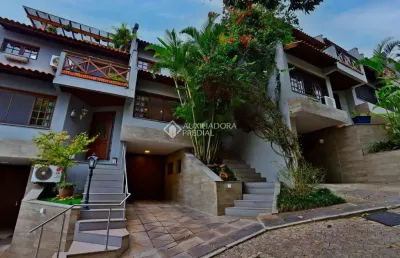 Casa em condomínio fechado com 3 quartos à venda na rua landel de moura, 1505, tristeza, porto alegre, 175 m2 por r$ 1.060.000