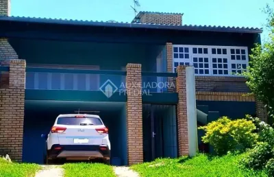 Casa em condomínio fechado com 4 quartos à venda na rua dos guananas, 290, espírito santo, porto alegre, 200 m2 por r$ 585.000