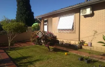 Casa em condomínio fechado com 3 quartos à venda na acesso das tulipas, 147, santa tereza, porto alegre, 154 m2 por r$ 700.000