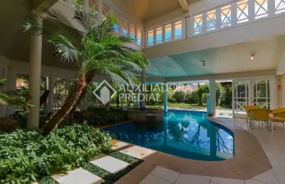 Casa em condomínio fechado com 4 quartos à venda na avenida da cavalhada, 5205, cavalhada, porto alegre, 927 m2 por r$ 6.000.000