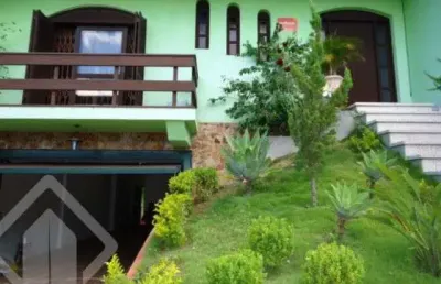 Casa em condomínio fechado com 4 quartos à venda na rua hipólito da costa, 63, santa tereza, porto alegre, 330 m2 por r$ 800.000