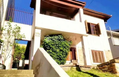 Casa com 3 quartos à venda na rua tomaz edison, 426, santo antônio, porto alegre, 140 m2 por r$ 362.000