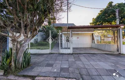 Casa com 3 quartos à venda na rua delfino riet, 287, santo antônio, porto alegre, 322 m2 por r$ 1.300.000