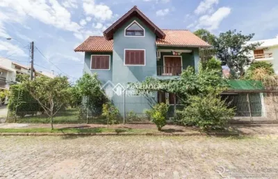 Casa em condomínio fechado com 4 quartos à venda na rua inês vinhas, 40, espírito santo, porto alegre, 220 m2 por r$ 990.000