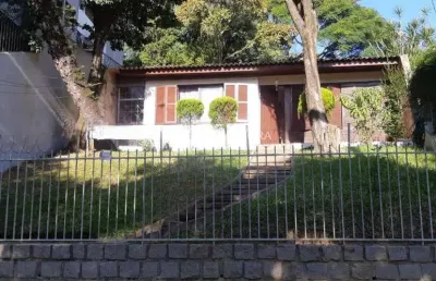 Casa com 3 quartos à venda na rua pedro chaves barcelos, 302, auxiliadora, porto alegre, 387 m2 por r$ 1.100.000