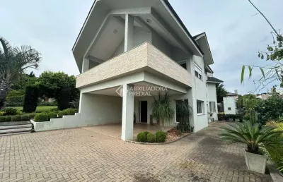 Casa em condomínio fechado com 3 quartos à venda na estrada capitão gentil machado de godoy, 4500, vila elsa, viamão, 357 m2 por r$ 1.620.000