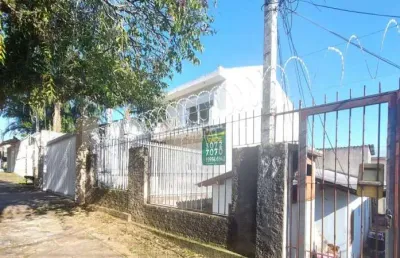 Casa em condomínio fechado com 5 quartos à venda na rua tomaz edison, 99, santo antônio, porto alegre, 269 m2 por r$ 298.000