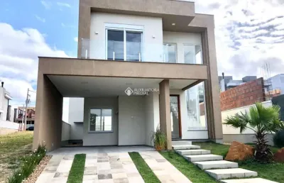 Casa em condomínio fechado com 3 quartos à venda na rua adolfo inácio de barcelos, 1490, centro, gravataí, 188 m2 por r$ 1.555.000