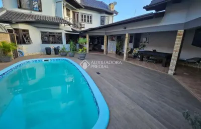 Casa com 3 quartos à venda na rua joão nicolau, 109, fátima, canoas, 344 m2 por r$ 1.700.000