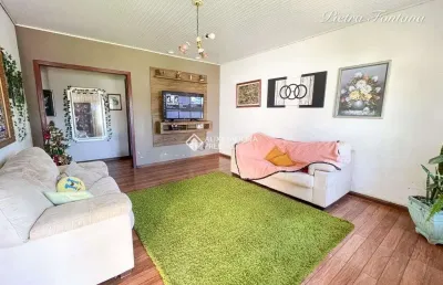 Casa com 4 quartos à venda na rua das camélias, 757, igara, canoas, 83 m2 por r$ 700.000