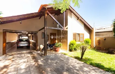 Casa com 3 quartos à venda na rua mem de sá, 529, nossa senhora das graças, canoas, 204 m2 por r$ 874.000