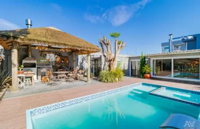 Casa com 4 quartos à venda na rua fab, 380, nossa senhora das graças, canoas, 586 m2 por r$ 3.123.000