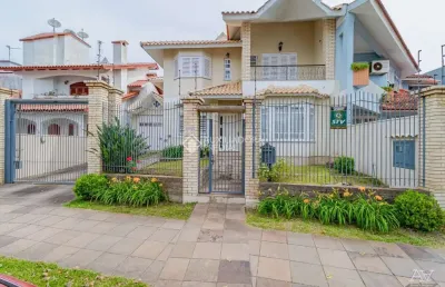 Casa com 4 quartos à venda na avenida doutor sezefredo azambuja vieira, 162, marechal rondon, canoas, 335 m2 por r$ 2.100.000