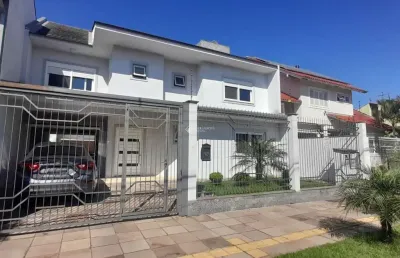 Casa com 4 quartos à venda na rua gardênia, 89, estância velha, canoas, 250 m2 por r$ 1.600.000