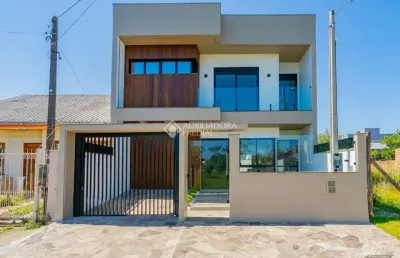 Casa com 5 quartos à venda na leonel de moura brizola, 71, harmonia, canoas, 215 m2 por r$ 1.260.000