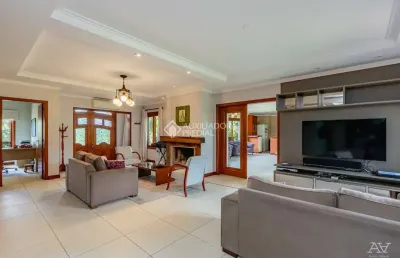 Casa com 4 quartos à venda na rua país de gales, 245, marechal rondon, canoas, 600 m2 por r$ 2.544.000