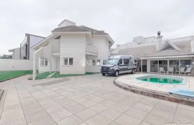 Casa com 3 quartos à venda na rua dinamarca, 177, marechal rondon, canoas, 367 m2 por r$ 2.128.000